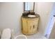Small bathroom with unique vanity and dark countertop at 3404 Gemini Dr, Raleigh, NC 27604