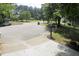Quiet residential street with houses and parked cars at 3404 Gemini Dr, Raleigh, NC 27604