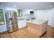 Modern kitchen with stainless steel appliances and island at 3404 Gemini Dr, Raleigh, NC 27604