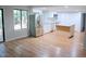 Open concept living room and kitchen with hardwood floors at 3404 Gemini Dr, Raleigh, NC 27604