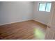 Bright bedroom featuring hardwood floors and ample natural light at 3404 Gemini Dr, Raleigh, NC 27604