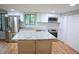 Modern kitchen with stainless steel appliances and island at 3404 Gemini Dr, Raleigh, NC 27604
