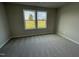 Bedroom with carpet and two large windows at 53 Grace Ridge Ct, Benson, NC 27504