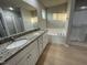 Bathroom with double vanity, garden tub, and shower at 53 Grace Ridge Ct, Benson, NC 27504