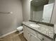 Bathroom with granite countertop and white cabinets at 53 Grace Ridge Ct, Benson, NC 27504