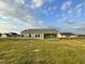 Exterior view of a ranch home with a covered patio at 53 Grace Ridge Ct, Benson, NC 27504