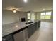Modern kitchen with granite countertops and stainless steel appliances at 53 Grace Ridge Ct, Benson, NC 27504