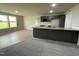 Modern kitchen with granite countertops and gray cabinets at 53 Grace Ridge Ct, Benson, NC 27504