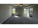 Large main bedroom with ceiling fan and en-suite bathroom at 95 Grace Ridge Ct, Benson, NC 27504