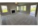 Bright living room with fireplace and access to backyard at 95 Grace Ridge Ct, Benson, NC 27504