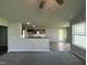 Open kitchen with granite countertops and breakfast bar at 95 Grace Ridge Ct, Benson, NC 27504