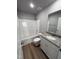 Bathroom with single vanity, granite countertop, and tub shower combo at 95 Grace Ridge Ct, Benson, NC 27504