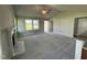 Open living room with a fireplace and view into kitchen at 95 Grace Ridge Ct, Benson, NC 27504