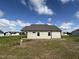 House exterior with neutral siding and a gray roof at 95 Grace Ridge Ct, Benson, NC 27504