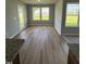 Bright dining area with wood flooring and access to patio at 95 Grace Ridge Ct, Benson, NC 27504