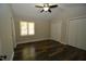 Spacious bedroom with hardwood floors, double closets and ceiling fan at 500 W Woodcroft Pkwy Pkwy # 8C, Durham, NC 27713