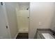 Clean bathroom featuring a shower stall and dark-colored flooring at 500 W Woodcroft Pkwy Pkwy # 8C, Durham, NC 27713