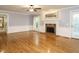 Living room features hardwood floors, fireplace, and built-in shelving at 363 Dublin Dr, Sanford, NC 27330