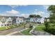 Aerial view of townhomes with playground and green space at 758 Dorset Stream Dr, Fuquay Varina, NC 27526