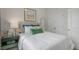 Bright bedroom with a double bed, nightstand, and ample closet space at 758 Dorset Stream Dr, Fuquay Varina, NC 27526