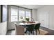 Bright dining room with a marble table and green chairs at 758 Dorset Stream Dr, Fuquay Varina, NC 27526