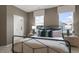 Bedroom with metal bed frame, nightstands, and access to a bathroom at 758 Dorset Stream Dr, Fuquay Varina, NC 27526