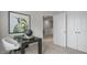 Home office with a desk and chair, adjacent to a hallway at 758 Dorset Stream Dr, Fuquay Varina, NC 27526