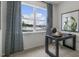 Bright office with a desk, window, and artwork at 758 Dorset Stream Dr, Fuquay Varina, NC 27526