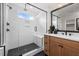 Bathroom with a walk-in shower and modern fixtures at 116 E Star Foal Ln, Wendell, NC 27591