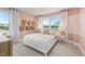 Bedroom with a white bed and window seat at 116 E Star Foal Ln, Wendell, NC 27591