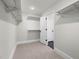 Large walk-in closet with built-in shelving at 116 E Star Foal Ln, Wendell, NC 27591