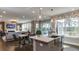 Open kitchen with island, stainless steel appliances, and breakfast bar at 2925 Hanging Valley Way # 397, Wake Forest, NC 27587