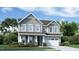 Two story home with gray siding and white trim at 2925 Hanging Valley Way # 397, Wake Forest, NC 27587