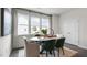 Bright dining area with marble table and green velvet chairs at 718 Dorset Stream Dr, Fuquay Varina, NC 27526