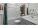 Clean bathroom with a tub/shower combo, and gray vanity at 718 Dorset Stream Dr, Fuquay Varina, NC 27526