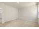 Spacious bedroom with carpeted floors and access to a bathroom at 804 Dorset Stream Dr, Fuquay Varina, NC 27526