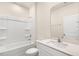 Clean bathroom with a tub, shower, and modern vanity at 804 Dorset Stream Dr, Fuquay Varina, NC 27526