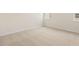 Bright bedroom with carpeted floors and a window at 804 Dorset Stream Dr, Fuquay Varina, NC 27526