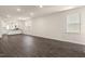 Bright and airy living room featuring hardwood floors and ample natural light at 804 Dorset Stream Dr, Fuquay Varina, NC 27526