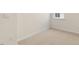Cozy carpeted bedroom with a window offering natural light at 804 Dorset Stream Dr, Fuquay Varina, NC 27526