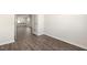 Office space with wood-look floors and view to living area at 804 Dorset Stream Dr, Fuquay Varina, NC 27526