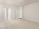 Spacious bedroom with carpet flooring and access to a bathroom and walk-in closet at 804 Dorset Stream Dr, Fuquay Varina, NC 27526