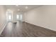 Spacious living area with wood-look floors at 804 Dorset Stream Dr, Fuquay Varina, NC 27526