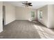 Large bedroom with carpet, ceiling fan and window at 330 Gilman Ln # 106, Raleigh, NC 27610