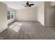 Spacious bedroom with carpet, ceiling fan and window at 330 Gilman Ln # 106, Raleigh, NC 27610