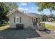 Side view of house showing additional deck and driveway at 813 Tucker St, Burlington, NC 27215