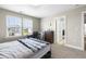 Bedroom with a queen bed, a desk, and a view at 137 Tayberry Ct, Holly Springs, NC 27540