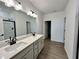 Modern bathroom with double vanity and walk-in shower at 125 S Stone Mill Trl # 241, Clayton, NC 27520