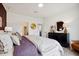 Main bedroom with dresser and en-suite bathroom access at 125 S Stone Mill Trl # 241, Clayton, NC 27520