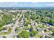 An expansive aerial view showcasing the neighborhood, the house's location, and the surrounding landscape at 412 Hamby St, Clayton, NC 27520